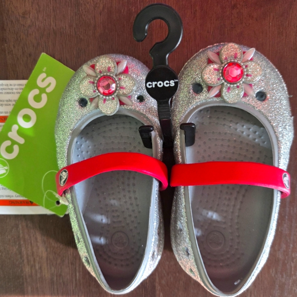CROCS Girls Silver Glitter Mary Jane Flats with Pink Gem Flower and Red Strap